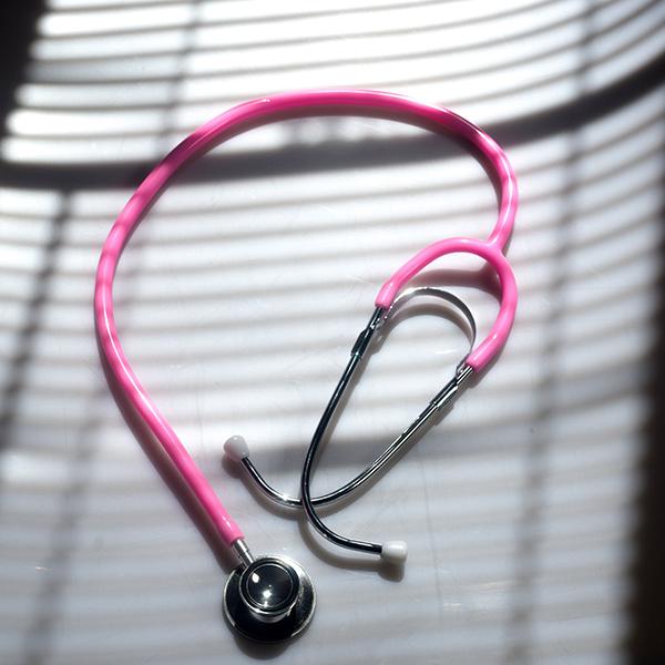 Pink Stethoscope on a table